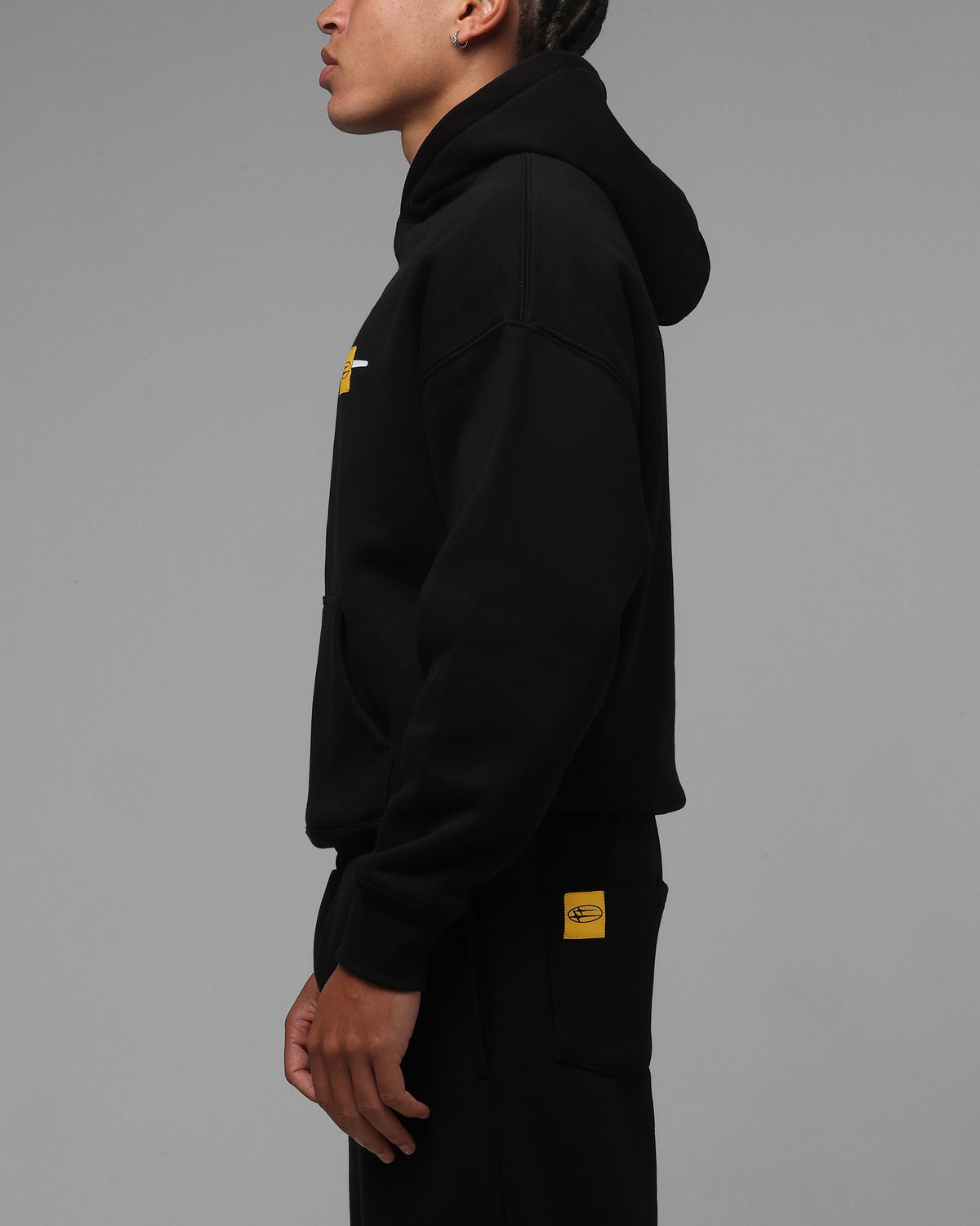 Black Pullover Hoodie with Printed Graphics and Embroidered Accents, Dropped Shoulder Design