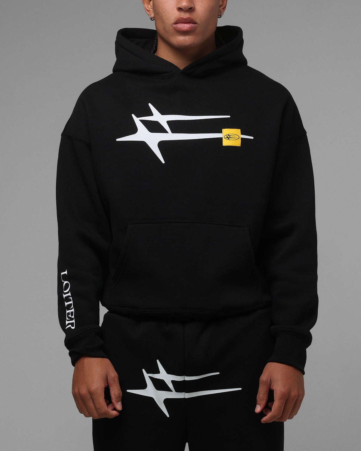Black Pullover Hoodie with Printed Graphics and Embroidered Accents, Dropped Shoulder Design