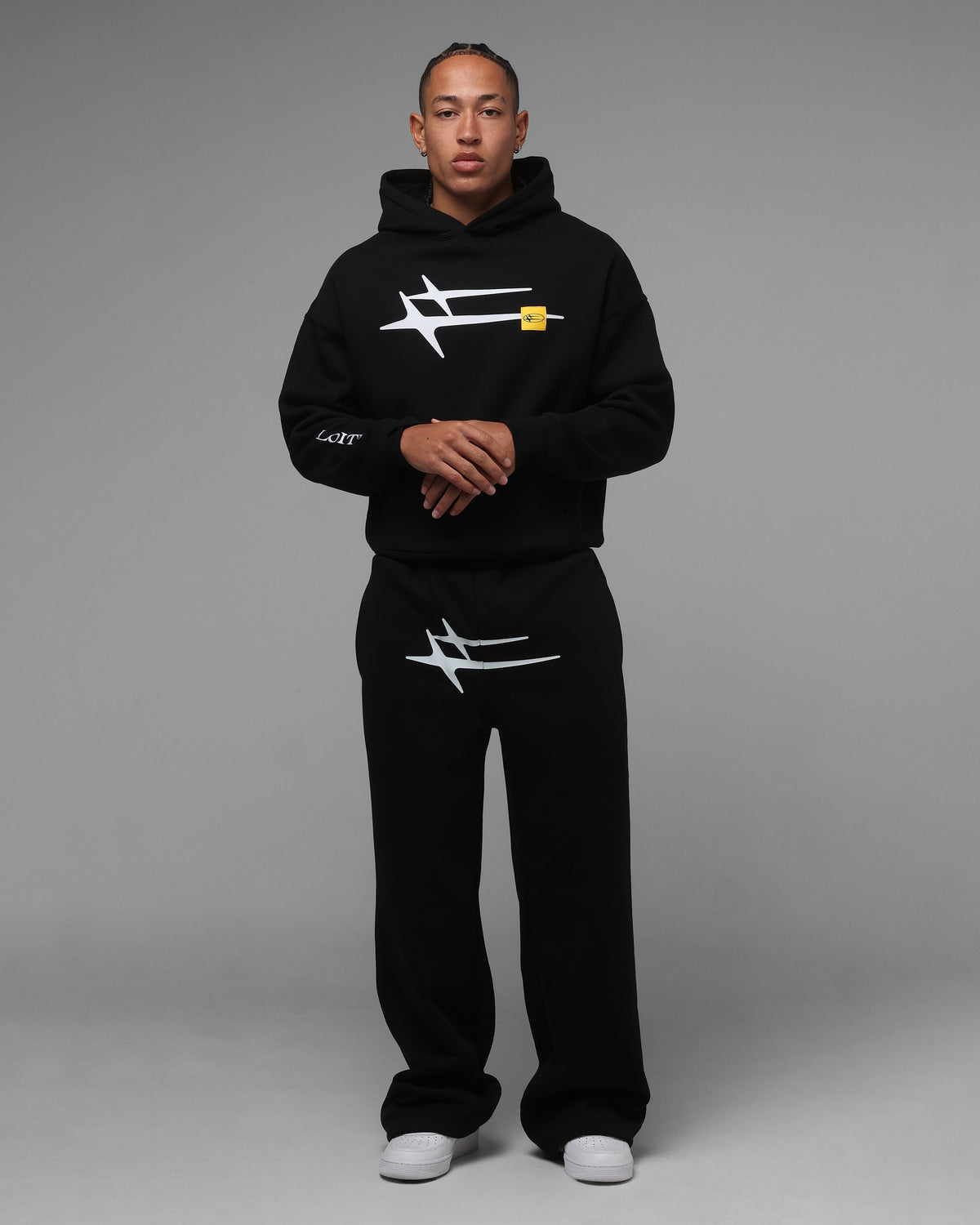 Black Pullover Hoodie with Printed Graphics and Embroidered Accents, Dropped Shoulder Design