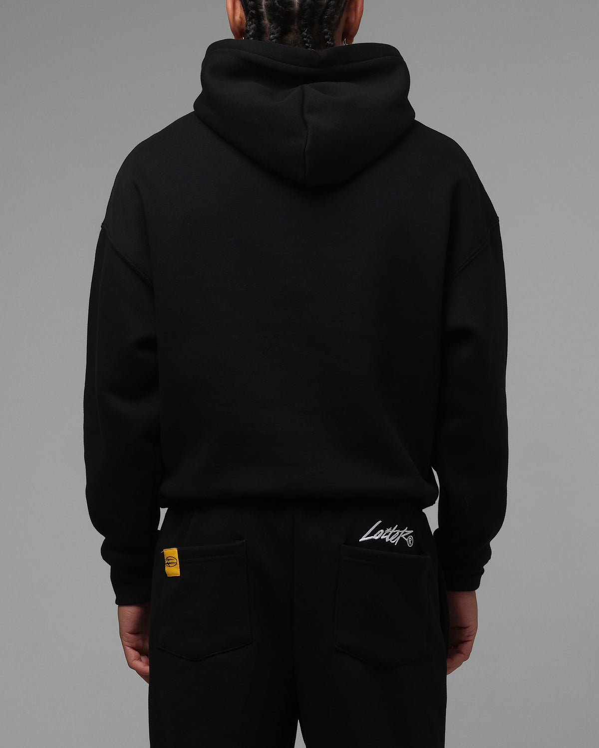Black Pullover Hoodie with Printed Graphics and Embroidered Accents, Dropped Shoulder Design