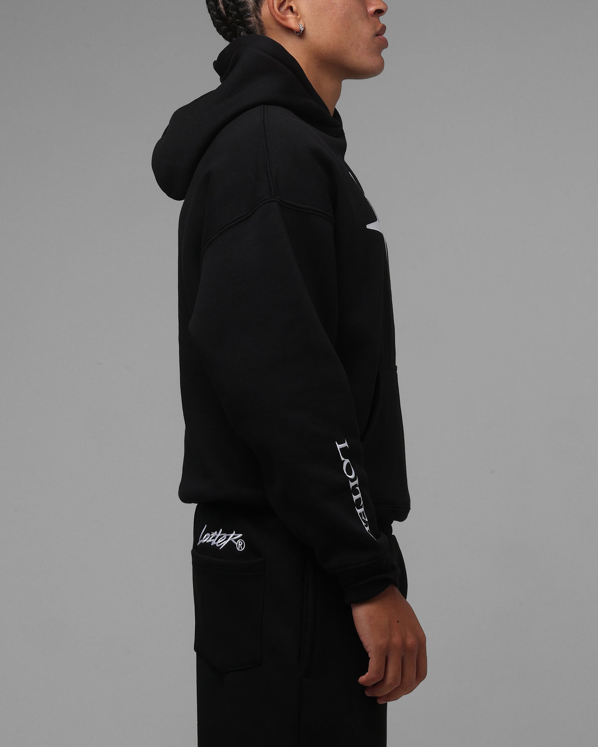 Black Pullover Hoodie with Printed Graphics and Embroidered Accents, Dropped Shoulder Design